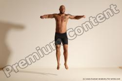 Underwear Gymnastic poses Man Black Muscular Bald Dancing Dynamic poses Academic